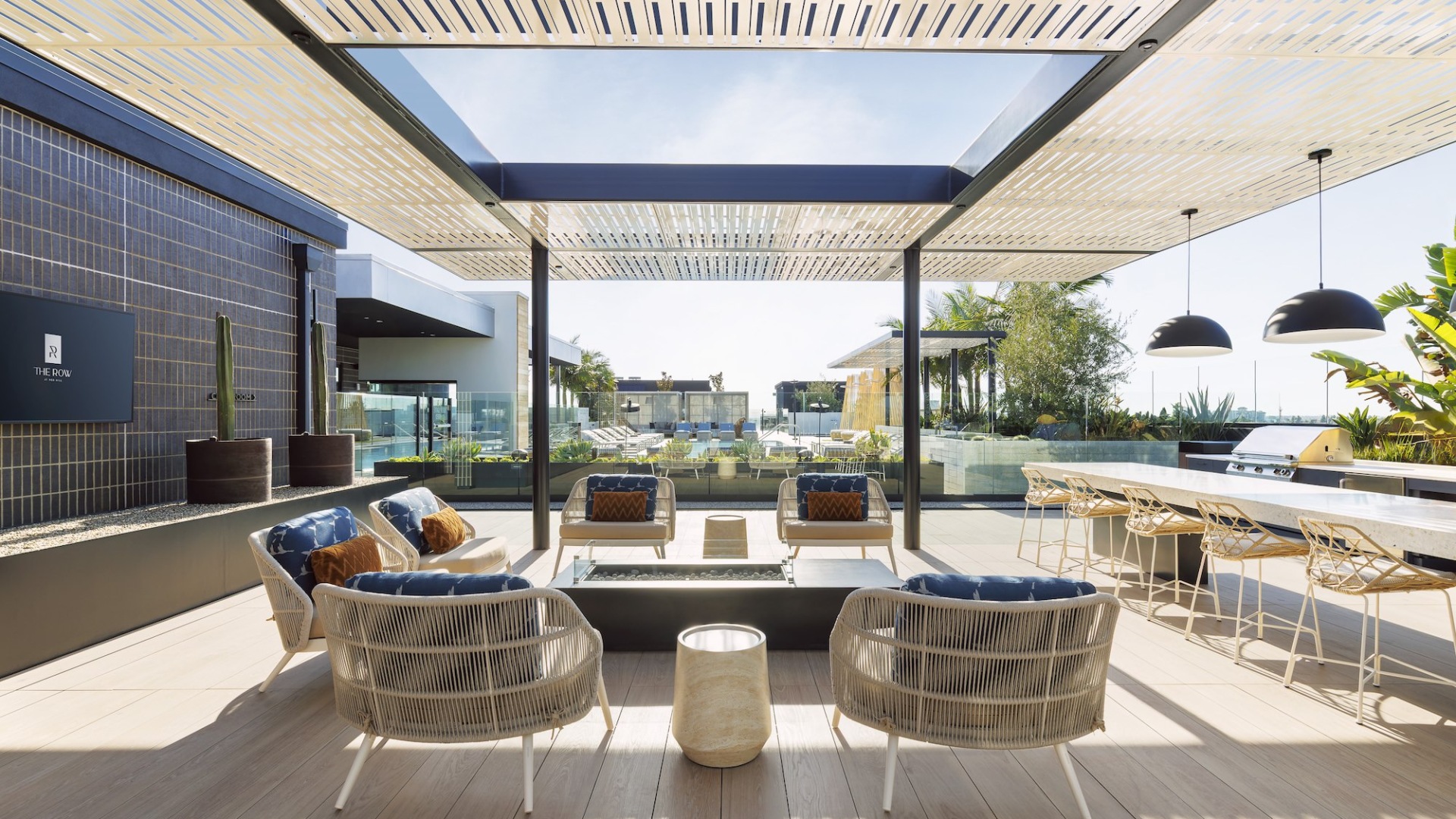 The Sunset Rooftop Outdoor Lounge and media area