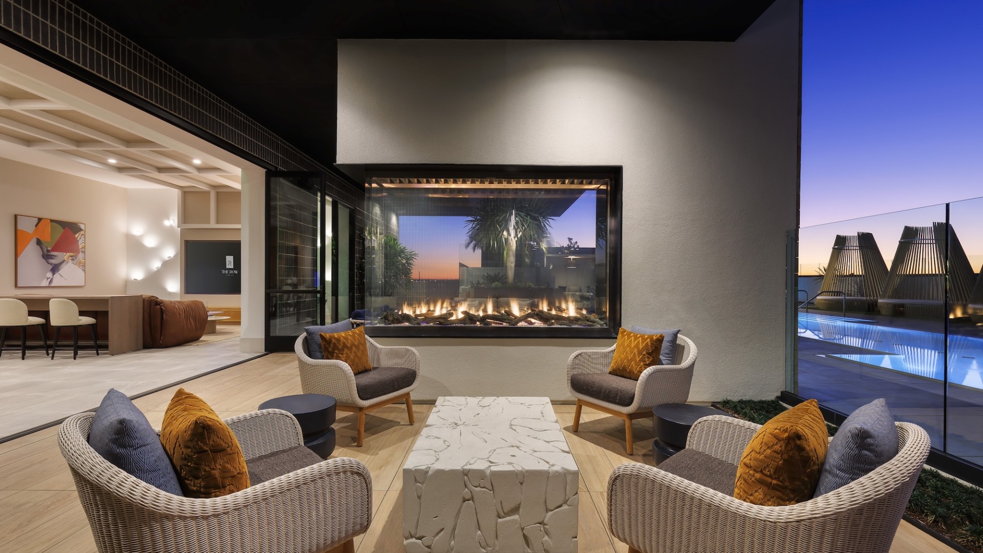 The Sunset Rooftop Lounge with a fireplace