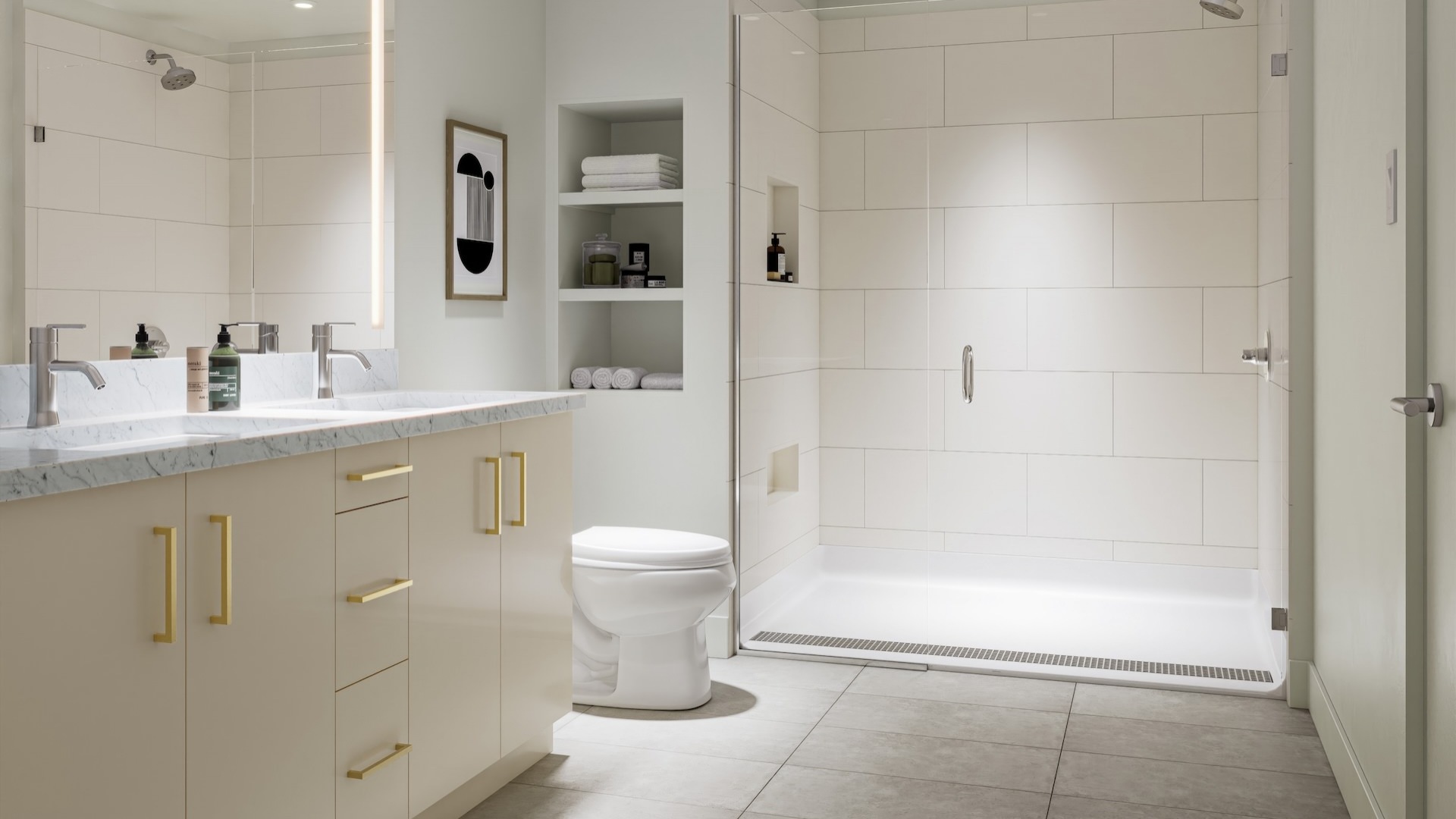 Large well lit bathroom with white accents 