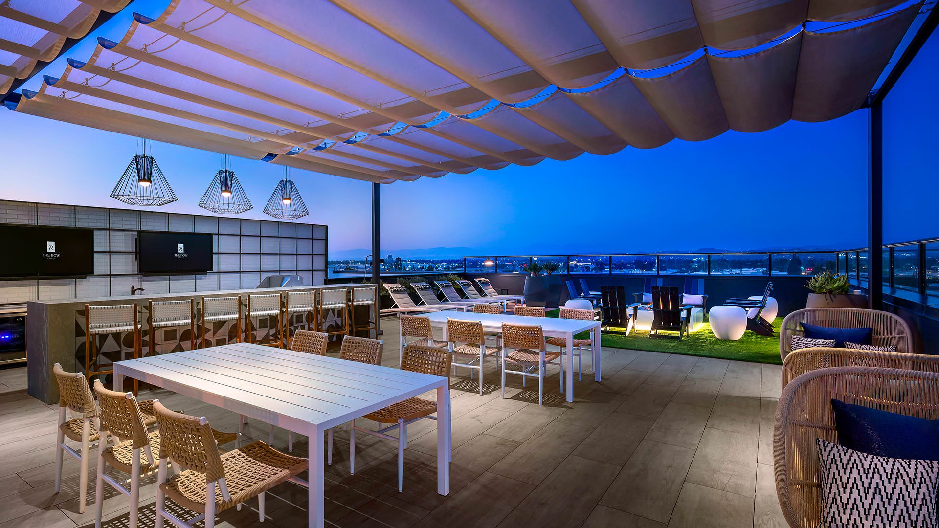 canvas covered dining area on rooftop lounge